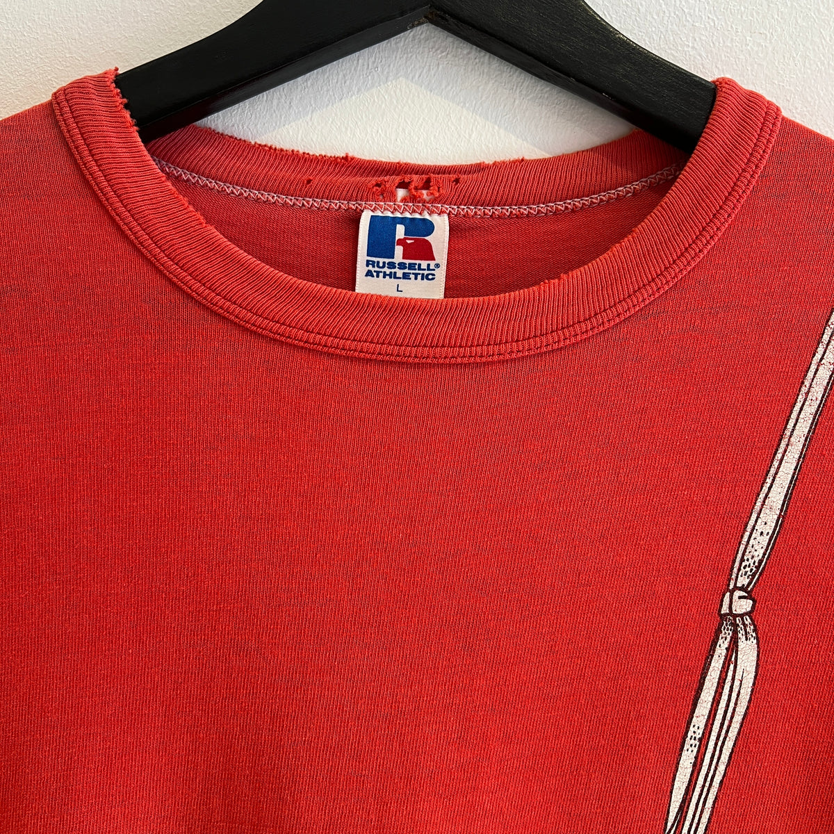 1980s Russell Athletic Faded Red T-Shirt with Nike Sneaker and Logo Print