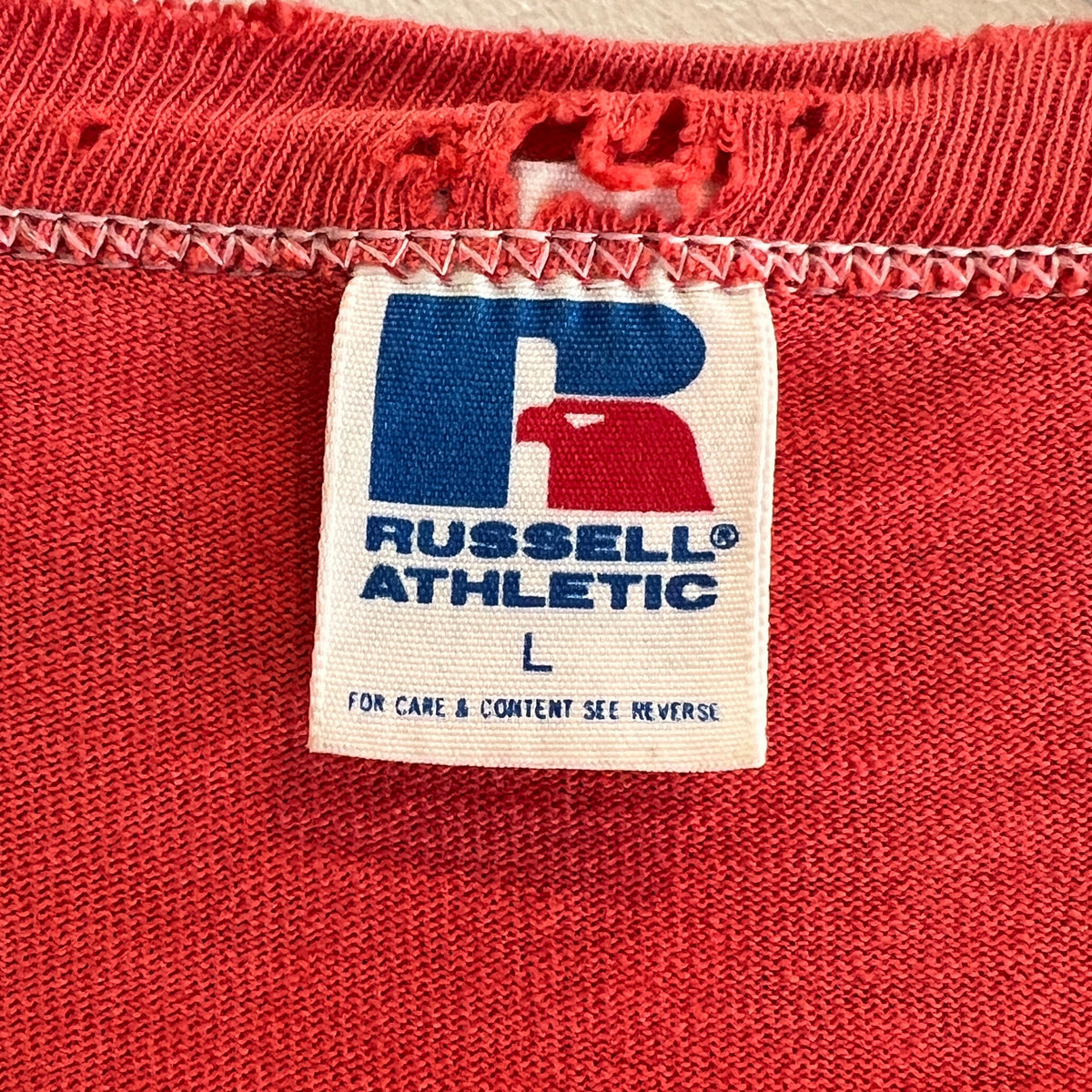 1980s Russell Athletic Faded Red T-Shirt with Nike Sneaker and Logo Print