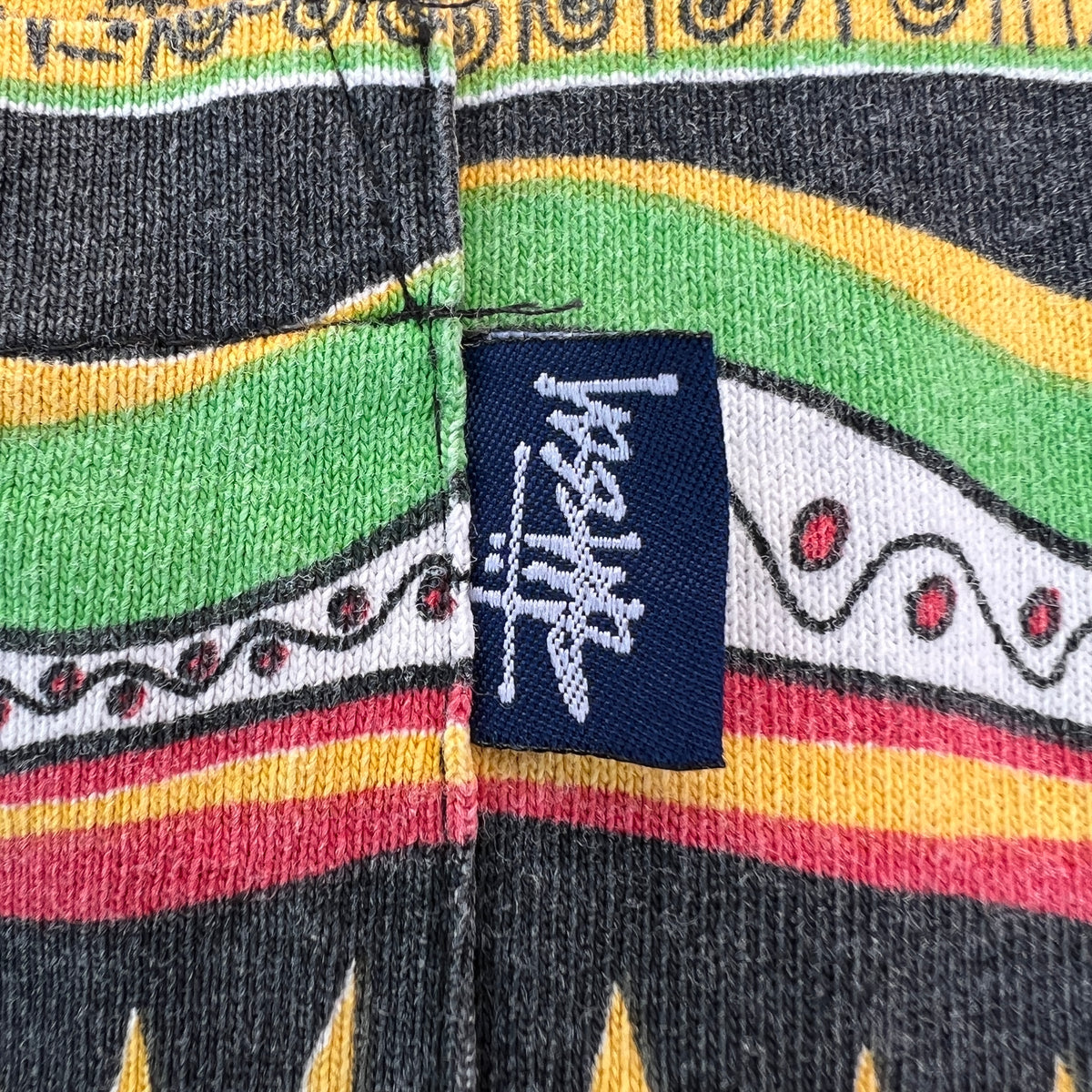 1980s Stüssy "TomTom" Irie Roots and Rasta Rydim Pocket T-Shirt with All-over Print